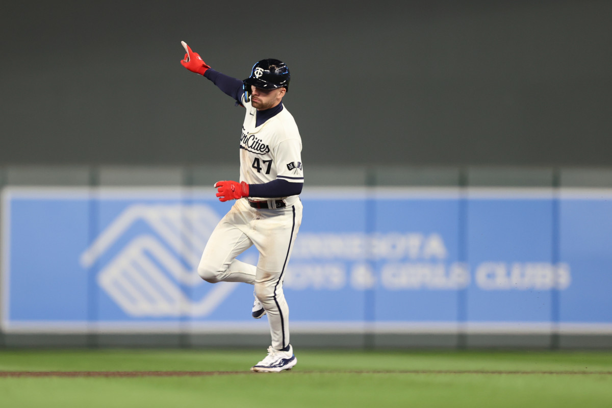 Edouard Julien celebrates his home run